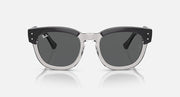 Sunglasses with dark round lenses, transparent dark-gray frame and silver center bridge