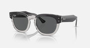 Sunglasses with dark lenses and transparent dark-gray frame, silver metal bridge