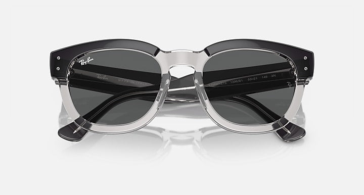 Ray-Ban Mega Hawkeye sunglasses, angled translucent frame with dark gray lenses