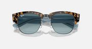 Tortoise sunglasses with blue lenses and double-bridge metal center