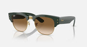 Dark green sunglasses with amber lenses, gold-toned frame and temples