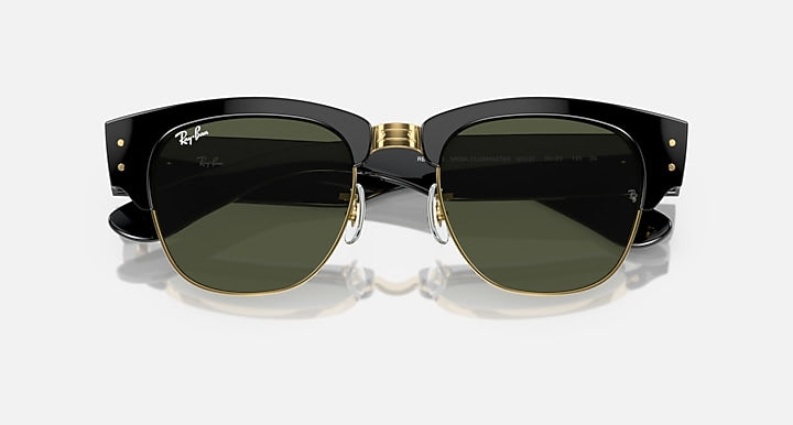 Clubmaster sunglasses front with dark green lenses, black frame, and gold-tone rims
