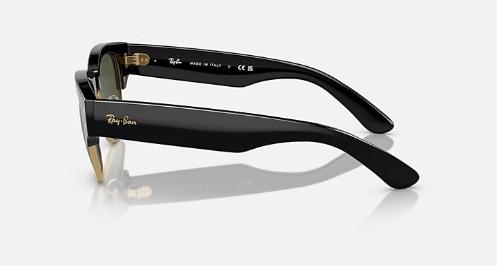Clubmaster sunglasses side profile with black frame and gold-tone temple details