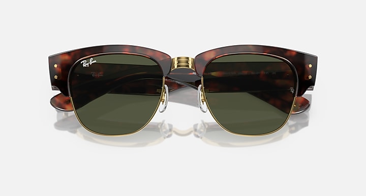 Tortoiseshell Mega Clubmaster sunglasses with dark lenses and gold-tone hinges