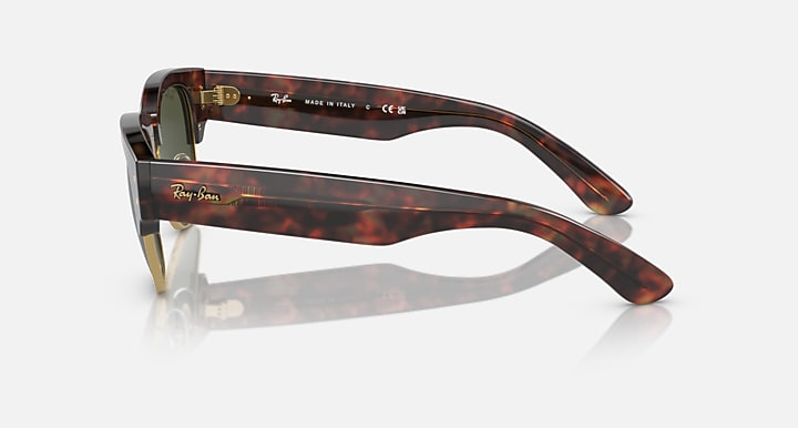 Tortoiseshell Mega Clubmaster sunglasses, side view, green-tinted lens and gold-tone arm
