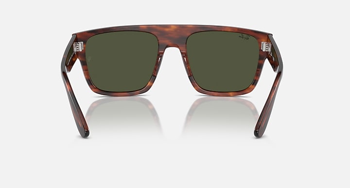 Tortoise square sunglasses with dark green lenses, front view close.