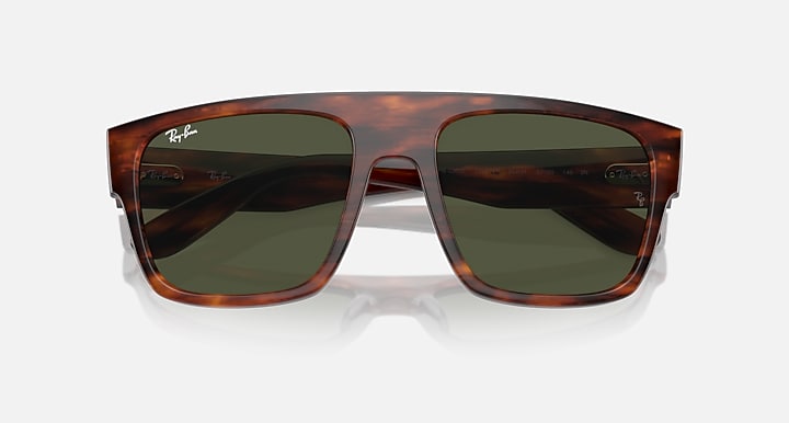 Tortoise sunglasses with dark green lenses, wider front view.
