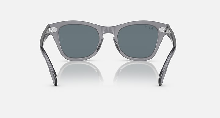 Sunglasses front view with dark gray lenses and clear gray acetate frame