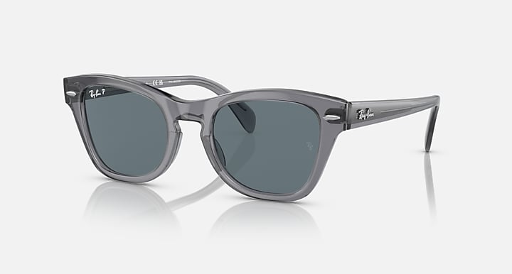 Ray-Ban wayfarer sunglasses with dark gray lenses and gray acetate frame