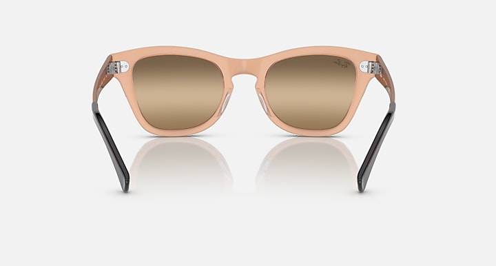 Transparent brown sunglasses, front view with square frames and warm taupe lenses