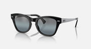 Black sunglasses with chunky square frames and blue-gray gradient lenses