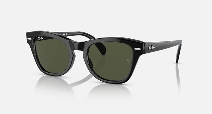 Black square sunglasses with dark green lenses and glossy black temple arms
