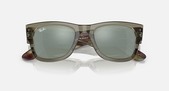 Square Wayfarer sunglasses with green tinted lenses and marbled brown/olive frame, angled view