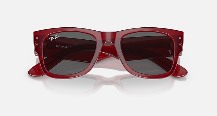 Ray-Ban Mega Wayfarer sunglasses angled front view with red frame and dark gray tinted lenses