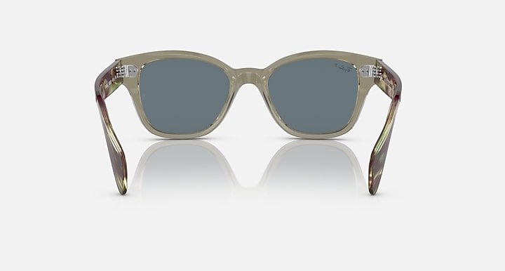Ray-Ban polarized sunglasses with dark blue lenses and clear green frame front