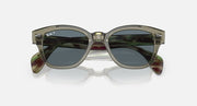 Ray-Ban polarized sunglasses with dark lenses and smoky translucent frame front