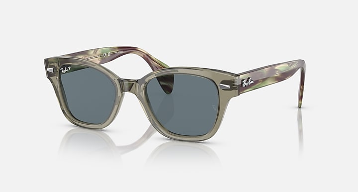 Ray-Ban polarized sunglasses with dark blue lenses and translucent green frame