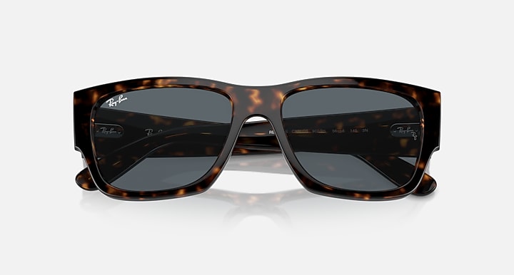 Tortoise acetate rectangular sunglasses with dark lenses and wide brow line