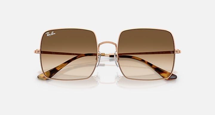 Ray-Ban RB1971 sunglasses front view with gold frames and brown gradient lenses