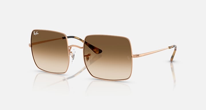 Ray-Ban RB1971 square sunglasses with gold frames and dark brown gradient lenses