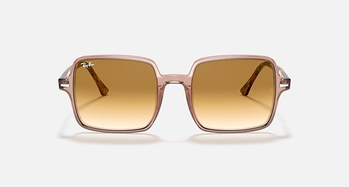 Ray-Ban square sunglasses with rose-pink frame and amber gradient lenses