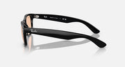 Wayfarer sunglasses side view with black frame, curved arms, brown gradient lenses