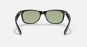 Black Wayfarer-style sunglasses with green lenses, straight-on front view.