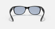 Ray-Ban Wayfarer sunglasses front view, blue-tinted lenses, black frames.