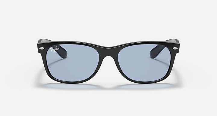Ray-Ban Wayfarer sunglasses, blue-tinted lenses, black frames, low bridge fit.