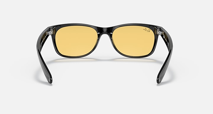 New Wayfarer sunglasses, black frame with amber lenses and small metal details