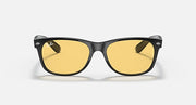 New Wayfarer sunglasses, black frame with amber lenses and curved top bridge
