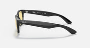 New Wayfarer sunglasses, black frame side view with amber lenses