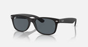 Ray-Ban Wayfarer sunglasses, dark gray lenses, matte black frames, low bridge fit.