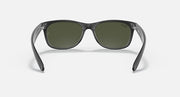 Ray-Ban Wayfarer sunglasses front view with dark frame and green lenses.