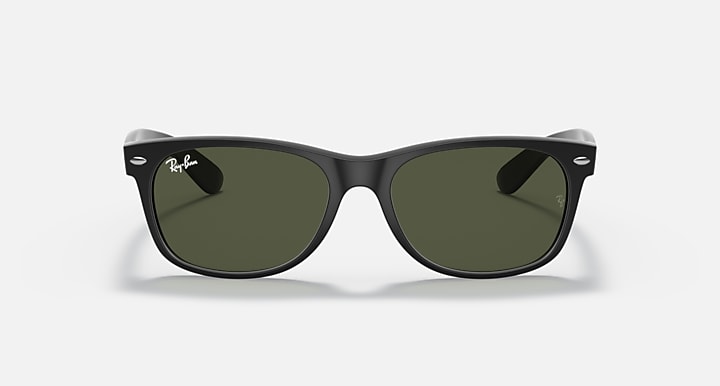 Ray-Ban Wayfarer sunglasses with dark green lenses and dark frame, relaxed front angle.