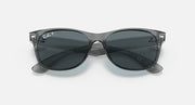 Clear grey Wayfarer-style sunglasses with dark lenses, front view, full-rim frame.
