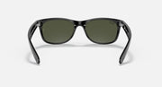 Ray-Ban Wayfarer sunglasses straight-on view with dark green lenses and dark frame.