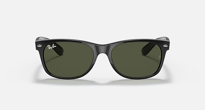 Ray-Ban Wayfarer sunglasses front view with dark green lenses and dark frame.