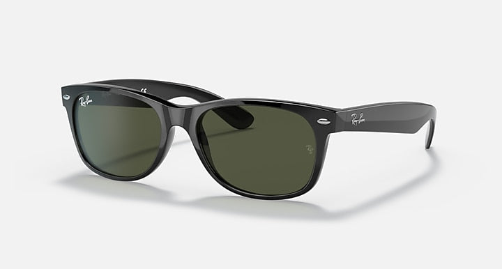 Ray-Ban Wayfarer sunglasses with black frame and dark green lenses, low bridge fit.