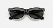 Ray-Ban Wayfarer sunglasses top view, black frame with dark green lenses and markings.