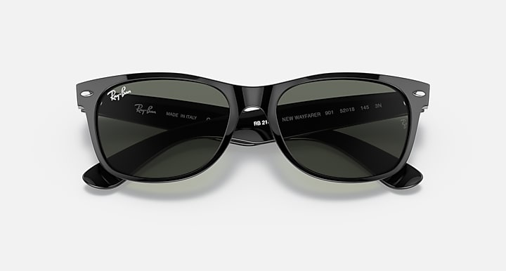 Ray-Ban Wayfarer sunglasses top view, black frame with dark green lenses and markings.