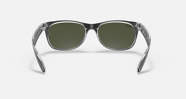 Ray-Ban New Wayfarer RB2132 sunglasses with dark green lenses and clear transparent frame