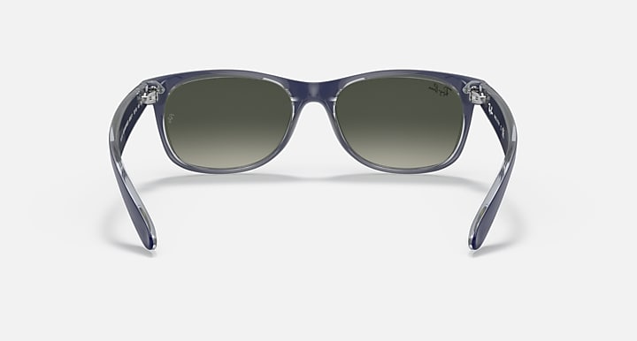 Ray-Ban New Wayfarer RB2132 sunglasses with dark green lenses and gray-blue transparent frame