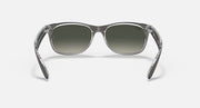 Ray-Ban New Wayfarer RB2132 sunglasses with transparent gray frame and green lenses