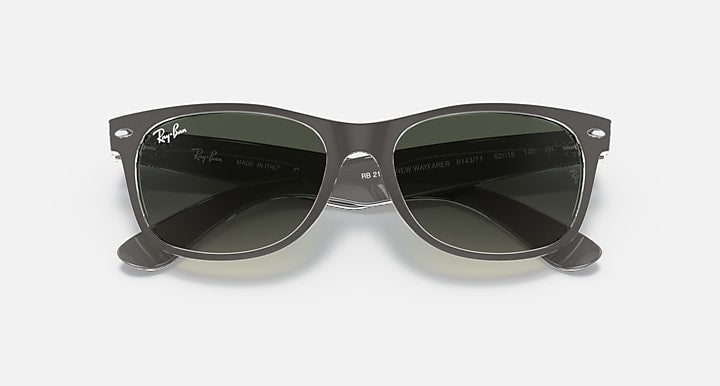 Ray-Ban New Wayfarer RB2132 sunglasses with dark frame and green tinted lenses