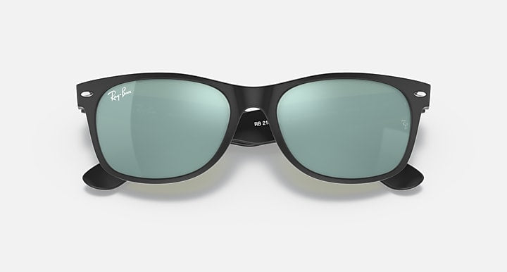 Wayfarer RB2132 sunglasses with black frames and light green tinted lenses