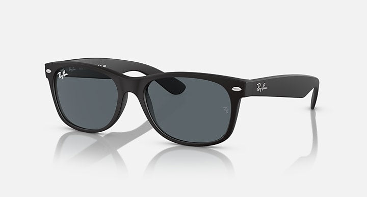 Ray-Ban New Wayfarer sunglasses angled view with dark frame and gray lenses