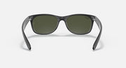 Matte black Wayfarer sunglasses with olive-green lenses, full-rim acetate frame