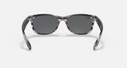 Ray-Ban New Wayfarer RB2132 sunglasses, translucent frame with dark gray lenses.