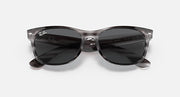 Ray-Ban New Wayfarer RB2132 sunglasses, dark frame with black lenses.